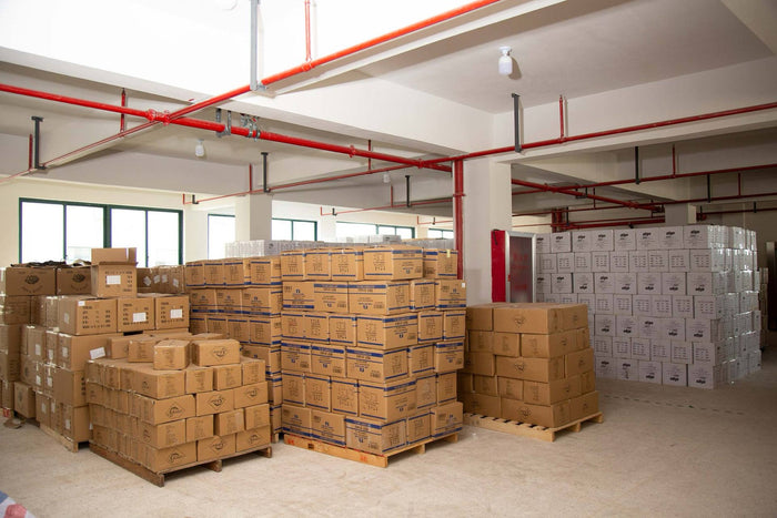 Packed cartons and pallets ready in warehouse