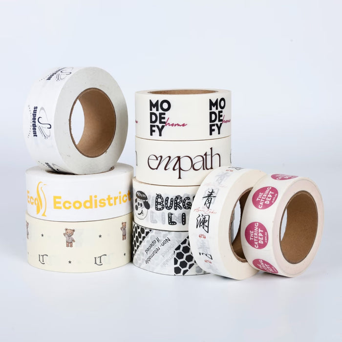 White background custom printed tape rolls with different logo designs